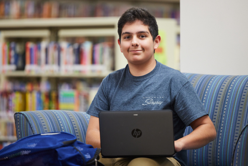 Male student with laptop